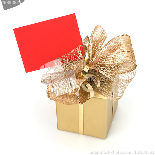 Image of Luxurious gift with note isolated on white background 