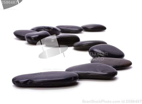 Image of black pebbles isolated on white background