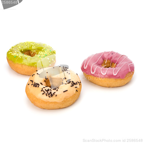 Image of Delicious doughnuts isolated on white background 