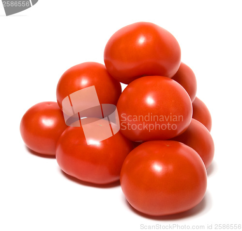 Image of red tomato isolated  on white background 