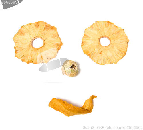 Image of human face imitation with dried fruits isolated on white backgro