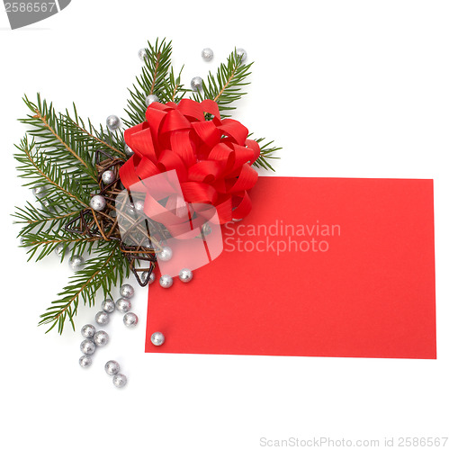 Image of Christmas decoration with greeting card isolated on white backgr