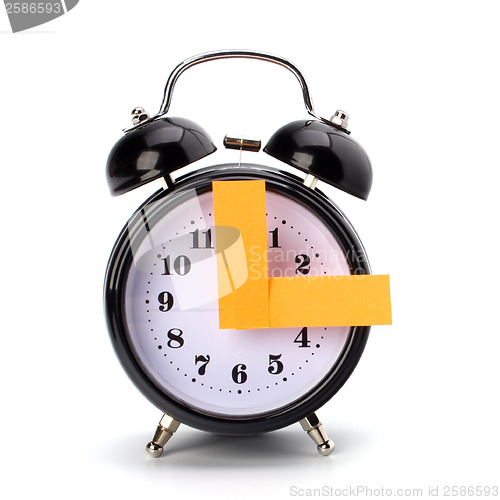 Image of Alarm clock with sticky paper 