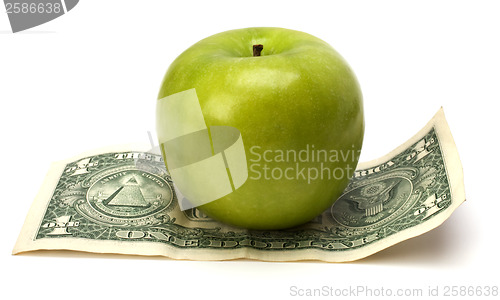 Image of Apple and money isolated.  Health concept