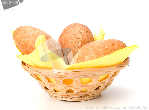 Image of fresh warm rolls in breadbasket isolated on white background