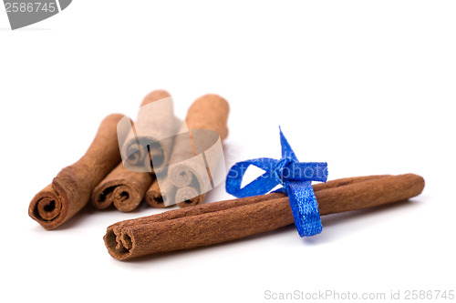 Image of Cinnamon sticks isolated on white background 
