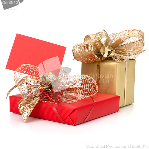 Image of 
Luxurious gifts with note isolated on white background 
