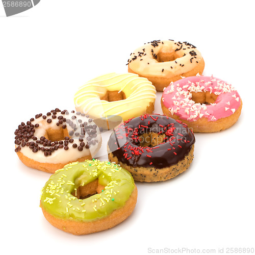 Image of Delicious doughnuts isolated on white background 