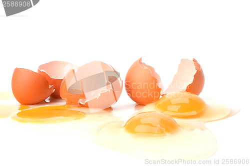 Image of broken eggs isolated on white background