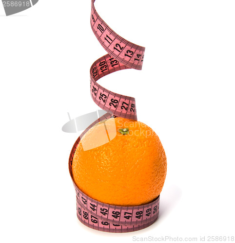 Image of  tape measure wrapped around the orange isolated on white backgr