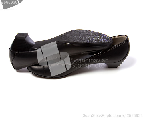 Image of female shoes with buckle isolated in white background