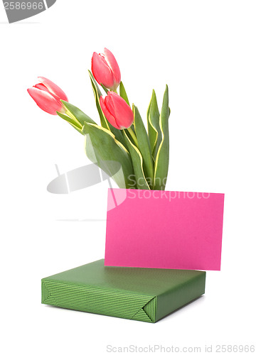 Image of gift with pink tulips  isolated on white background