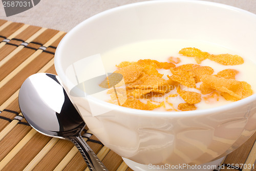 Image of Healthy breakfast. Bowl with corn flakes.