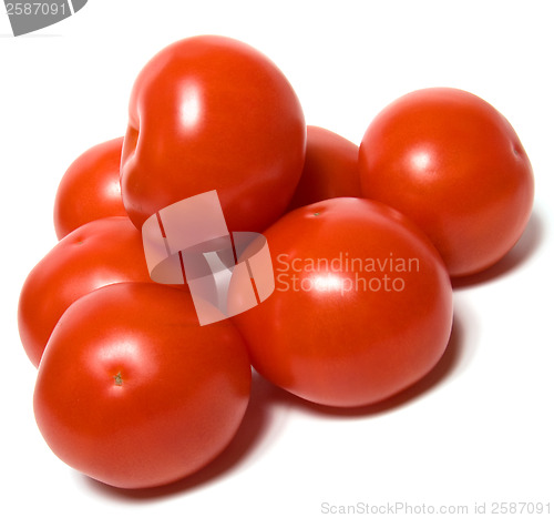 Image of red tomato isolated  on white background 