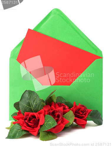 Image of Envelope with floral decor. Flowers are artificial. 