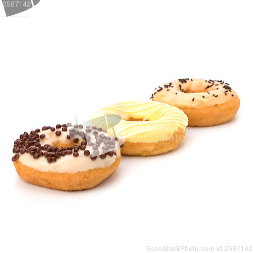 Image of Delicious doughnuts isolated on white background 