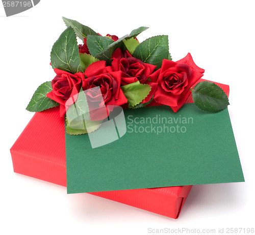 Image of Gift with floral decor. Flowers are artificial. 