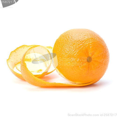 Image of orange with peeled spiral skin isolated on white background