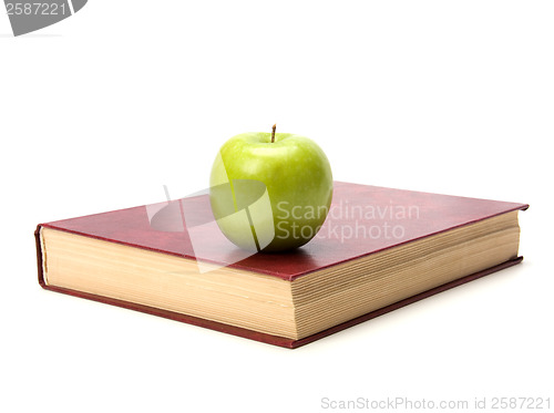 Image of book with apple isolated on white background 