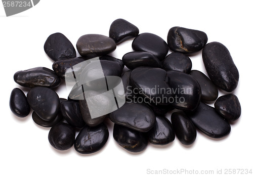 Image of Heap of black pebbles isolated on white background