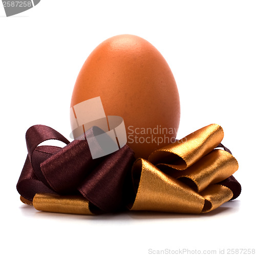 Image of easter egg with bow isolated on white background