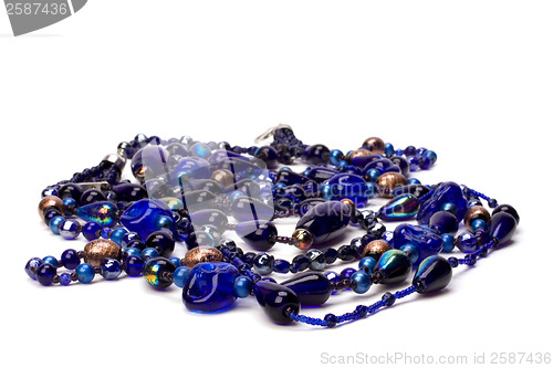 Image of blue beads isolated on white background