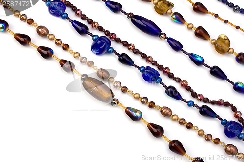 Image of colourful beads background on white 