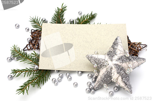 Image of Christmas decoration with greeting card isolated on white backgr