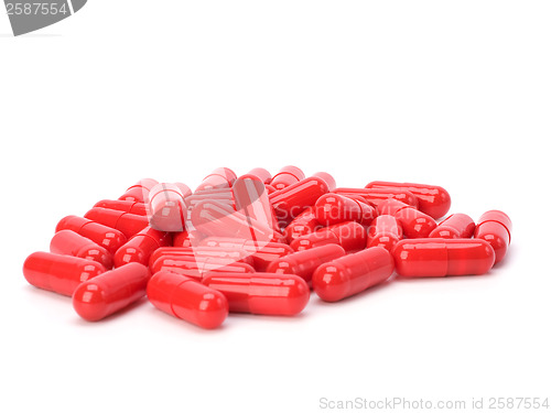 Image of red capsules isolated on white background