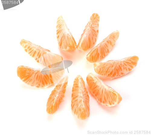 Image of peeled mandarin segments isolated on white background