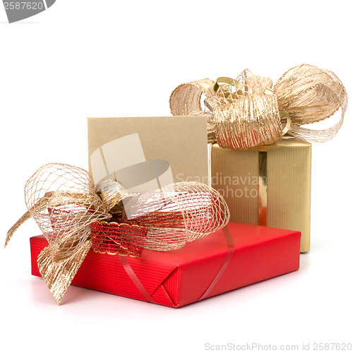 Image of 
Luxurious gifts with note isolated on white background 
