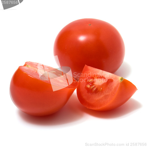 Image of sliced tomato isolated on white background