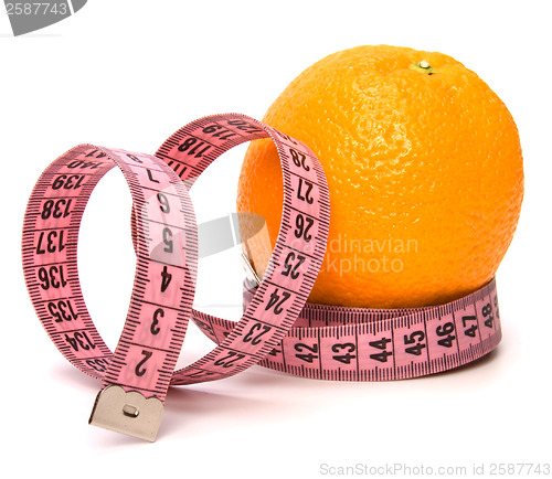 Image of  tape measure wrapped around the orange isolated on white backgr