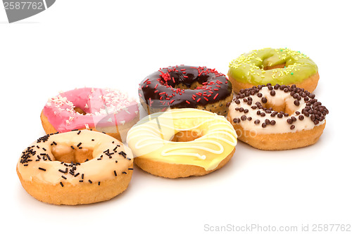 Image of Delicious doughnuts isolated on white background 