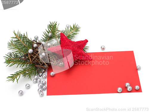 Image of Christmas decoration with greeting card isolated on white backgr