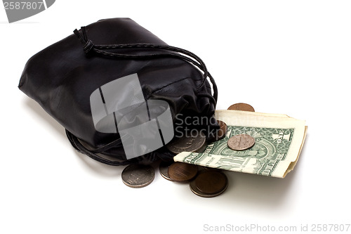 Image of Money in leather  bag isolated on white  background 