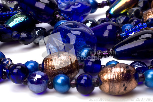 Image of blue beads isolated on white background