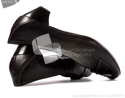 Image of female shoes with buckle isolated in white background