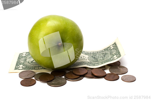 Image of Apple and money isolated.  Health concept