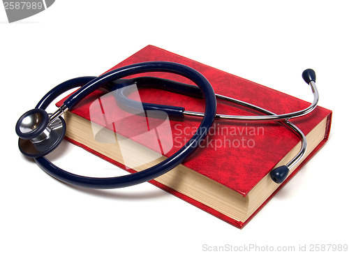 Image of stethoscope on red book isolated on white background