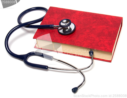 Image of stethoscope on red book isolated on white background