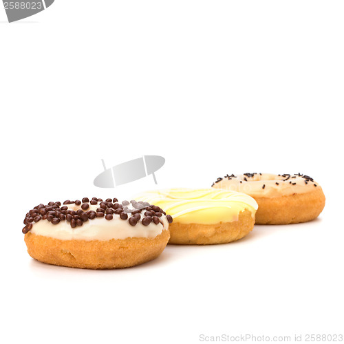 Image of Delicious doughnuts isolated on white background 