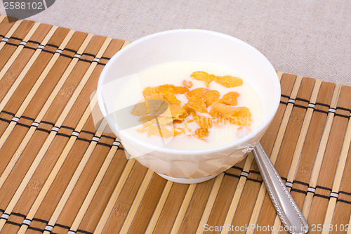 Image of Healthy breakfast. Bowl with corn flakes.