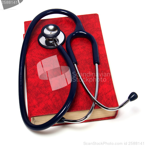 Image of stethoscope on red book isolated on white background