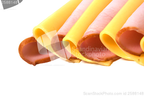 Image of meat and cheese slices isolated on white 