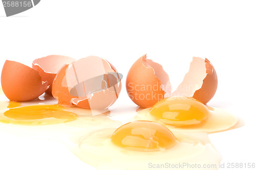 Image of broken eggs isolated on white background