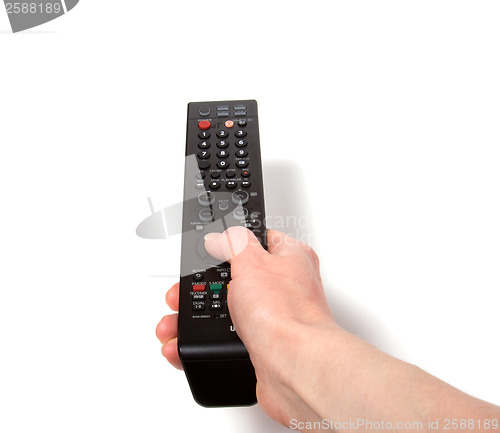 Image of Hand holding tv remote control isolated on white background 