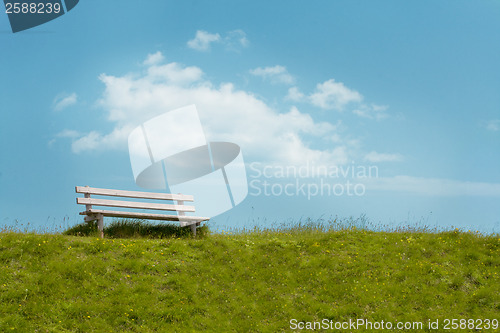 Image of 
Bench on sky background. Tranquil scene.

