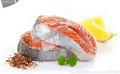 Image of fresh raw salmon steak slices