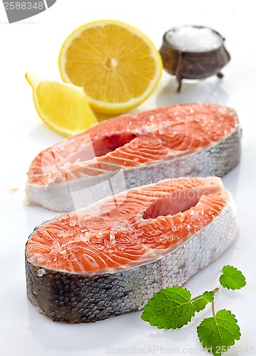 Image of fresh raw salmon steak slices